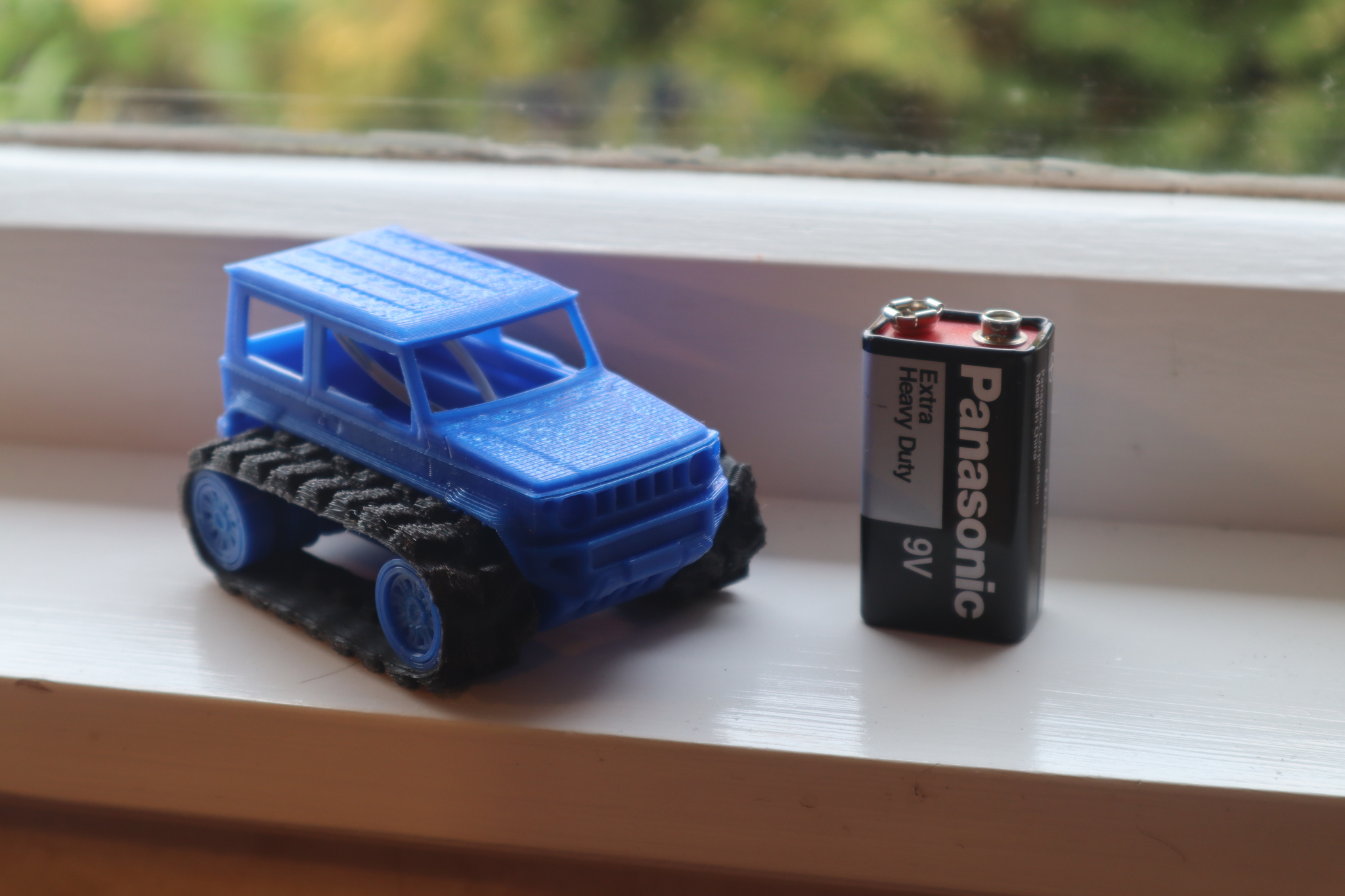 With 9v battery for size